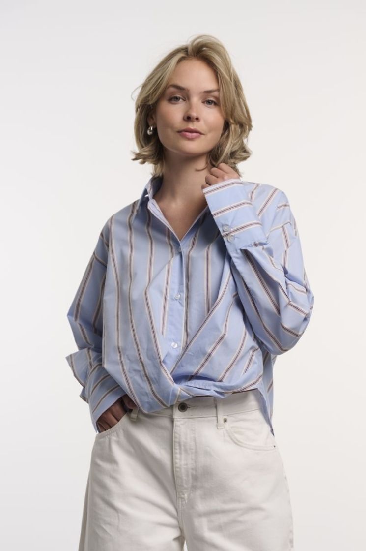 BLOUSE WITH TWIST BOTTOM BLUE STRIPED