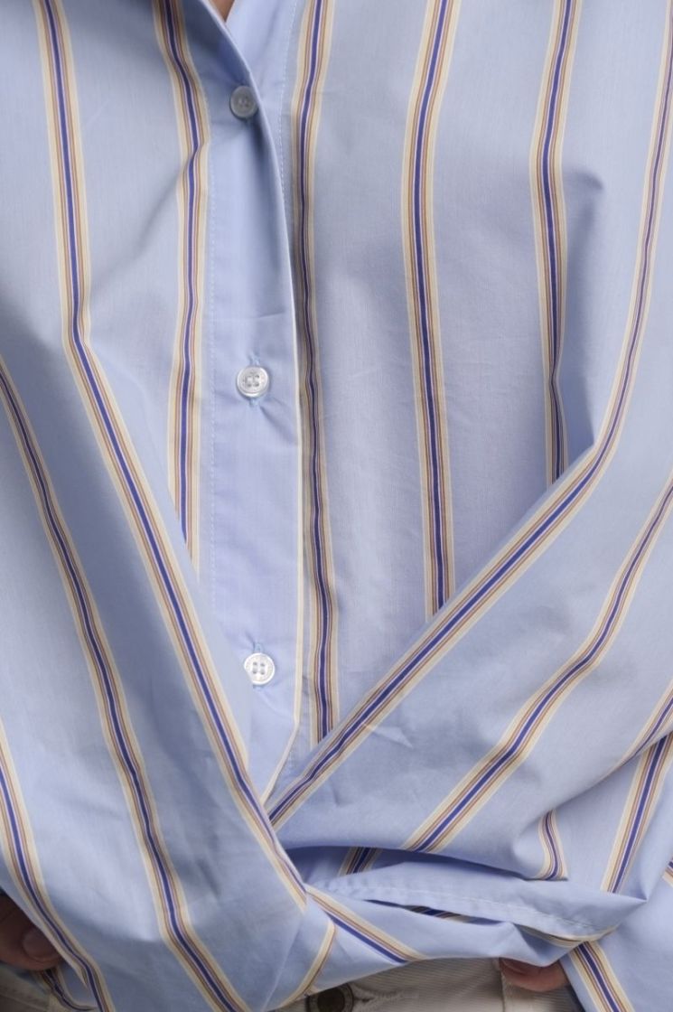 BLOUSE WITH TWIST BOTTOM BLUE STRIPED